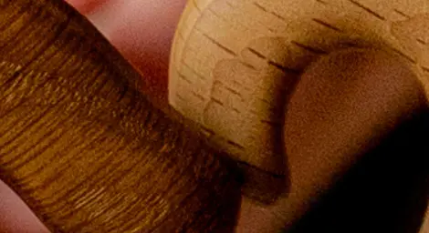 lady-and-young-girl-holding-wooden-elephant